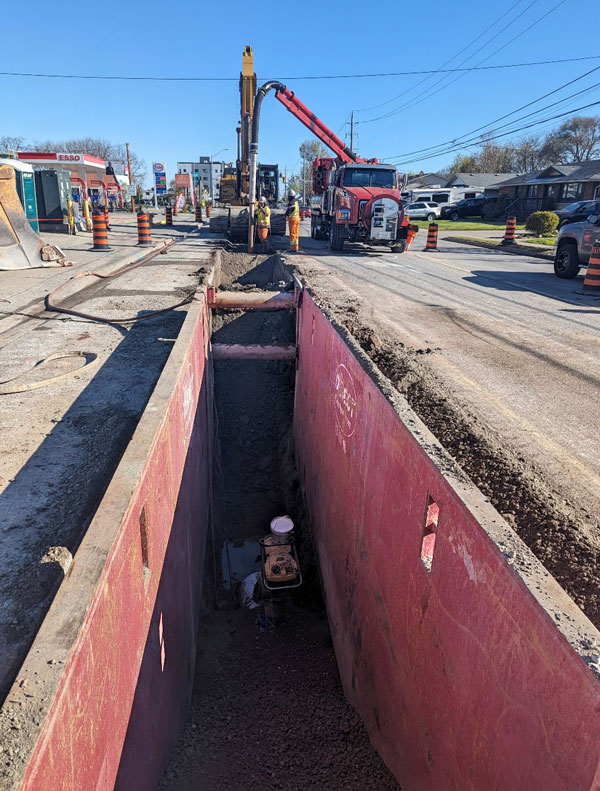 Shown is the installation of a valve chamber near Greenlane Road.