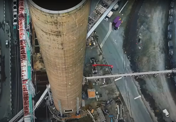 A crew of about six on the platform will operate concrete crunchers and breakers assisted by two robotic excavators to remove chunks of concrete the size of basketball, dropping them down the Copperstack to crash to the bottom.