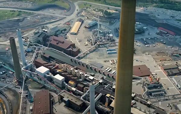 The 450-foot Copperstack, far left, is dwarfed by the 1,250-foot Superstack at Vale’s Copper Cliff Smelter Complex near Sudbury. Both will be demolished by the end of the decade.