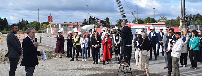 Brian Sutherland (left) of Argo and Jim Ritchie of Tridel address stakeholders gathered for the groundbreaking of Tridel’s Harbourwalk residence at Mississauga’s Lakeview Village.