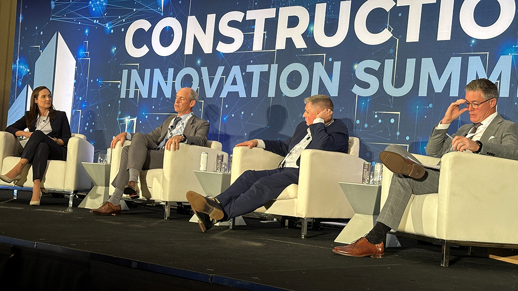 Construction leaders discussed risk and disruption at the recent ICBA Construction Innovation Summit. From left, Beedie executive vice-president and panel moderator Beth Berry; Ledcor president Jeff Watt; Graham Construction president and CEO Andy Trewick; and EllisDon president and CEO Kieran Hawe.