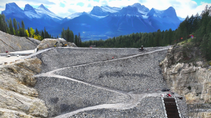 The Cougar Creek Debris Flood Retention Structure, shown here nearing completion in October, sits 600 metres upstream of Canmore’s Cougar Creek neighbourhood.