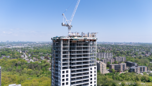 Bela Square community celebrates topping off of 35-storey tower