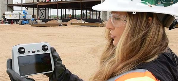 Roxanne Gross, a senior digital construction co-ordinator for Bird ion, demonstrates drone monitor and controls at a site where the drone is able to document the site progress for the owner. Bird ion was one of the companies that contributed to training the MCSC’s trainer for its SkySkills program.