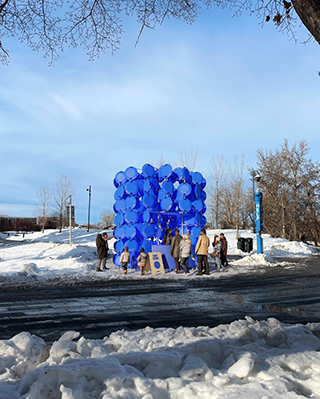 The Dot Spot Pavilion is an interactive public art installation that’s inspired by the snow sled or flying saucer. The sled is repurposed as the main architectural material.