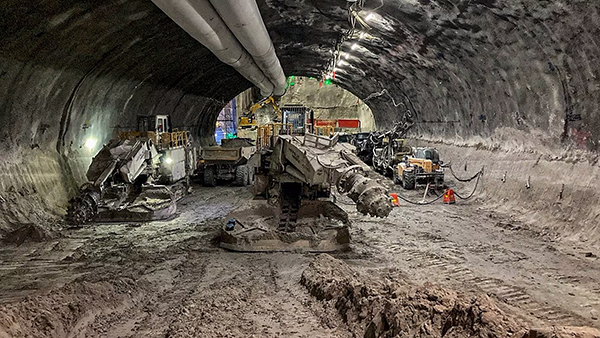 The roadheader machine is 22 metres long, weighs 115 tonnes and can work its way through 1,000 tonnes of material each day. It operates in the sequential excavation method.