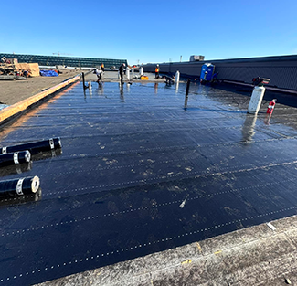 Canadian roofers are concerned over potential cost escalations if roofing materials are included in Canada’s proposed retaliatory import tariffs. Pictured is a roofing job in Quebec.