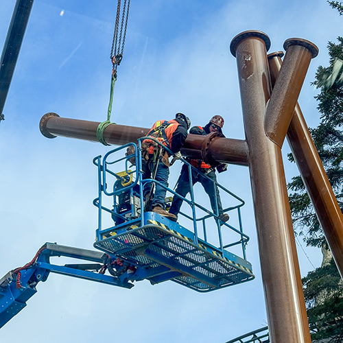 Pictured are support columns being put in place for the roller-coaster.