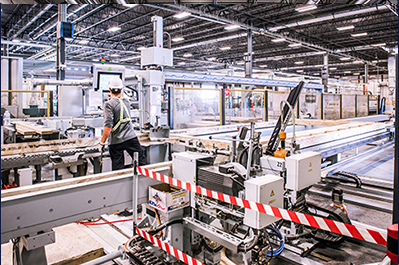 Rather than manual bespoke methods, fabrication of factory-built componentry for wall, floor and roof panels are automated using a series of robotic arms for easy assembly onsite with fewer workers.