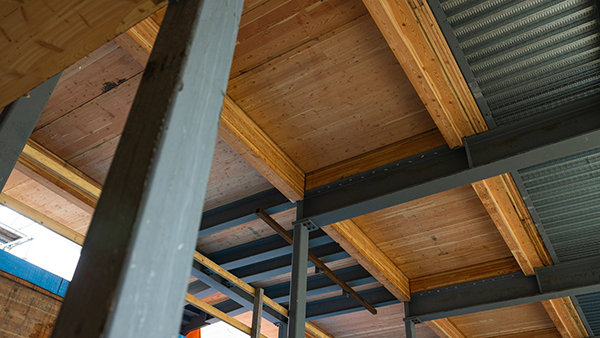 The CLT/CFS system is a cost-effective and structurally efficient system that helps meet the demand for taller mass timber buildings.