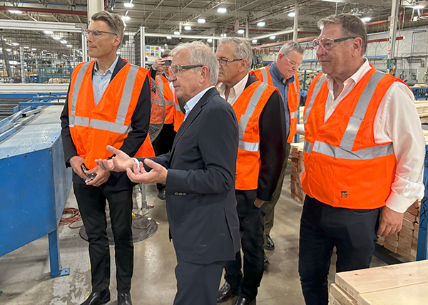 From left, federal Housing and Infrastructure Minister Gregor Robertson, executive chairman at Great Gulf Low Rise Tad Putyra, RESCON president Richard Lyall and Ernie Rinomato, co-founder of Rinomato Group of Companies.