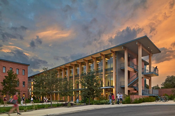 The exposed natural wood surfaces, combined with large glass façades, create bright open interior spaces throughout Dicke Hall.