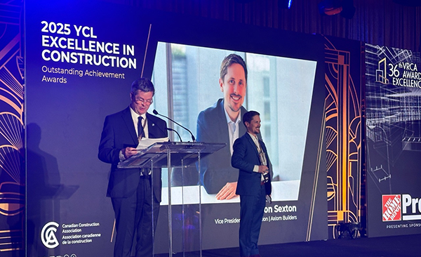 Axiom Builders vice-president of construction Eamon Sexton (right) won the YCL Excellence in Construction award at the 36th Annual VRCA Awards of Excellence. The award is given to an exceptional VRCA member under the age of 40.