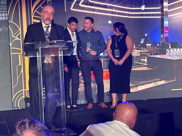 Etro Construction took the gold in the General Contractors - Tenant Improvement - $5 Million to $12 Million category for work on Speeders Richmond. The award was presented by the JOC’s director of news media Vince Versace (left).