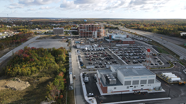 Drone shot of the new energy centre (foreground), which will power, heat and cool the buildings, with most of the fuel coming from wood chips supplied by a local mill.