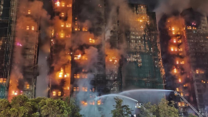 Hong Kong fire probe reveals unsafe netting as public mourns and government stifles dissent