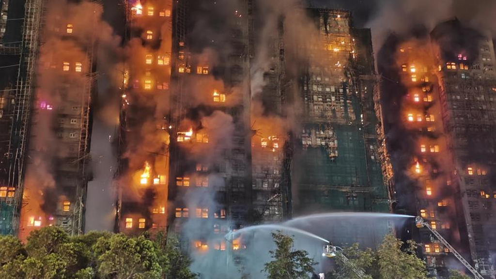 3 arrested in Hong Kong, as a highrise fire leaves at least 36 dead and 279 reported missing