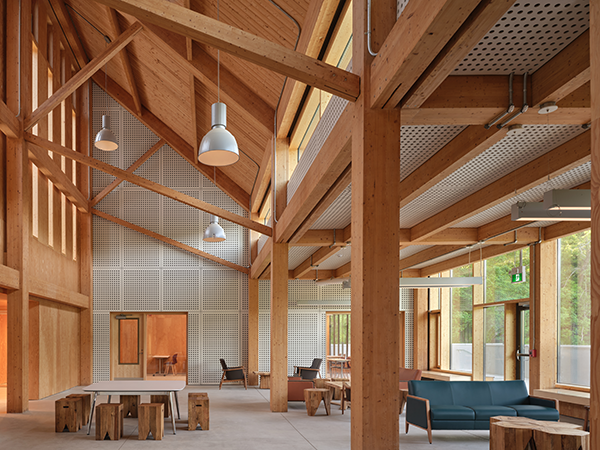Roughly half of the building’s structure is comprised of glulam columns and beams supporting a tongue-and-groove deck. The remainder, including the dormitory, is built of lightwood framing.