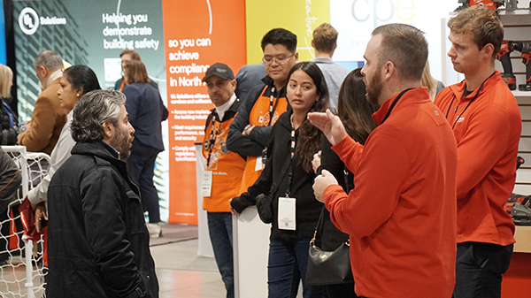 Picking up building advice at the exhibit show floor of the Buildings Show.