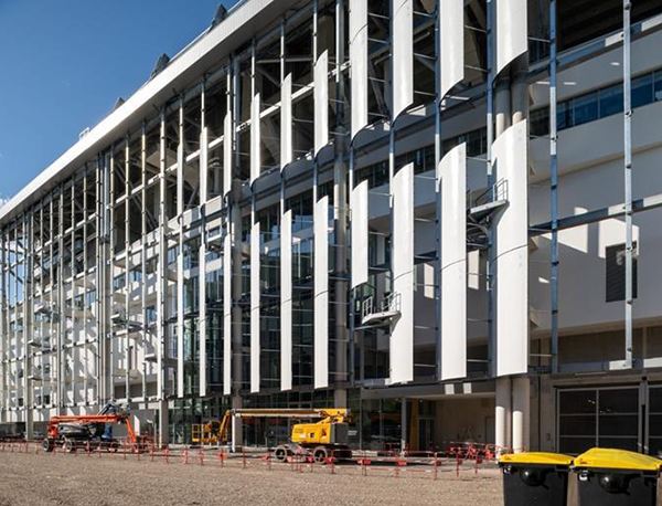 Fuselage sections cut from decommissioned Airbus A340 jet liners were used as a shading device on the Stade de la Meinau in Strasbourg, France.