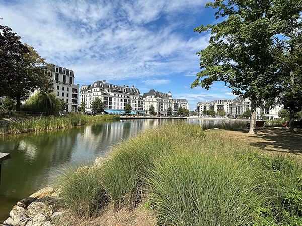 The Clamart Panorama development outside Paris offers gentle density in the form of low-rise Parisian-styled residential buildings built to high energy standards alongside several sustainable features.