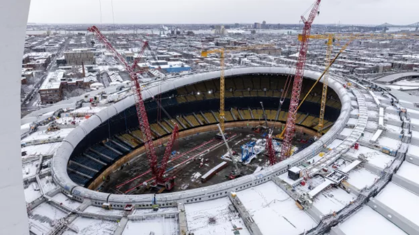 Crews are currently working on installing the technical ring that runs around the stadium's top edge. The ring, which is being raised in 38 segments, will house equipment such as ventilation and lighting, and will support a new sound system.