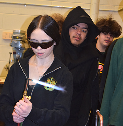 Sixteen-year-old Chloe Costa was first in line to handle an oxy-acetylene torch during Trade Day Friday at Hamilton’s Bishop Ryan school.