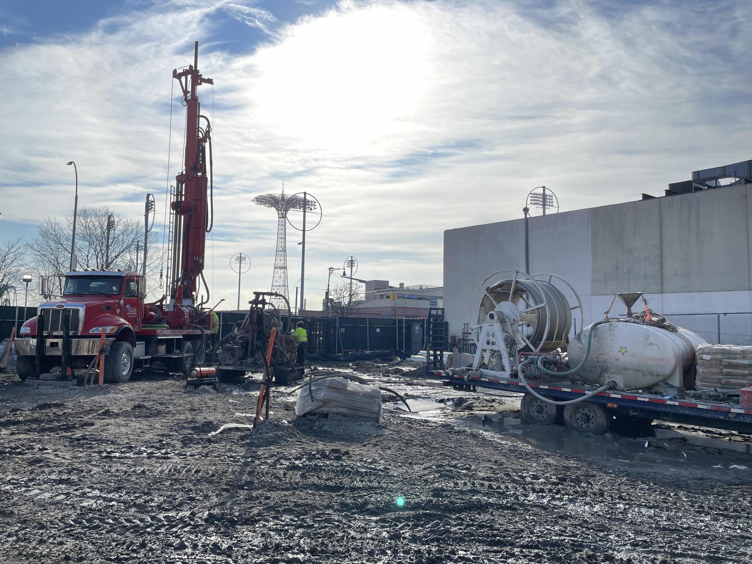 The first step to install the system was drilling 153 boreholes for the geothermal field. Concrete piles and pile caps were placed and once the concrete subfloor was in the mechanical room manifold piping was installed.