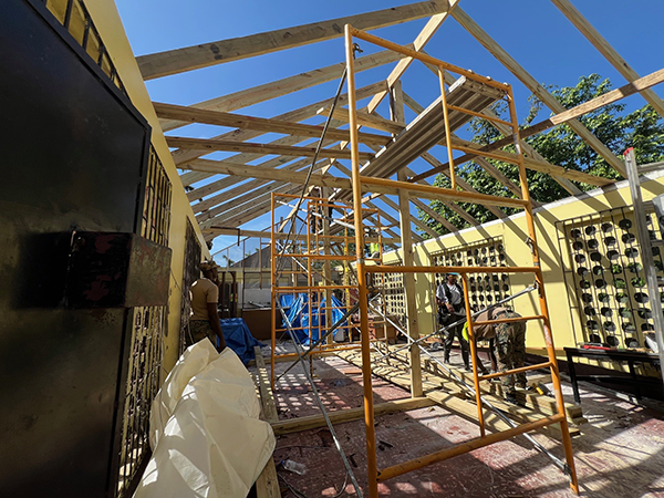 For Rok Gueye, who led the Local 27 carpenters, choosing to take off two weeks, work long hours for no pay was a no brainer. She is seen here helping to restore a school in St. Elizabeth Parish.