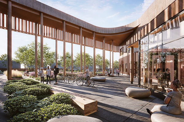 A two-storey link extends out from this second block to connect the new structure with the old. Together, they form a new landscaped courtyard.