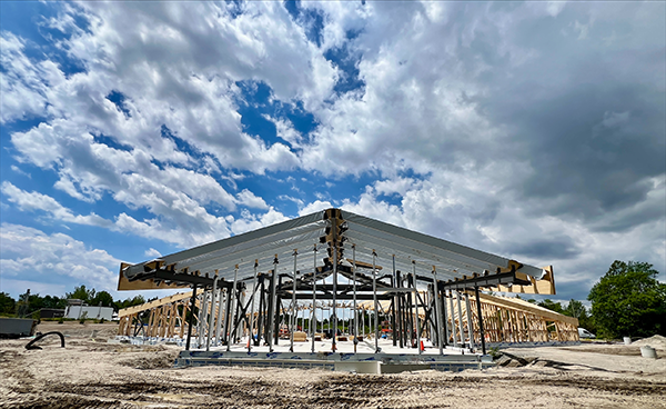Key sustainability strategies include net-zero operational carbon, partial mass timber con-struction, rain gardens and bioswales for stormwater management, and cool roof. Pictured: Construction continues at the Meadowvale Road site in east Toronto.