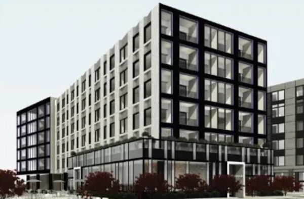 An image shows one of the three buildings delayed at least until next year that form part of a new Detroit mixed-use neighborhood known as Future of Health.