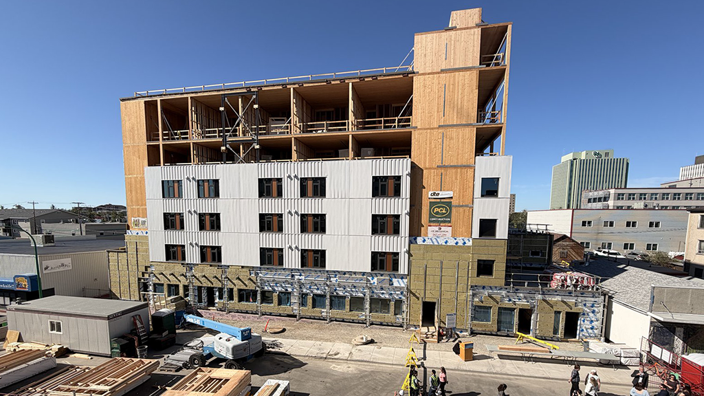 Yellowknife mass timber housing project reaches topping-out milestone