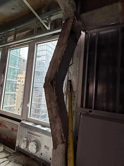 Two internal support columns were buckling and several upper floors were sagging columns, forcing evacuations and a work shutdown.