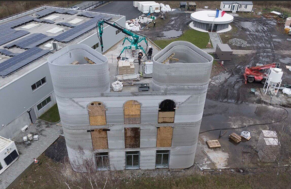 The 14.14-metre-high Citadel of Know-How tower in Bruay-sur-l'Escaut, France is currently the tallest 3DCP structure occupied by humans.
