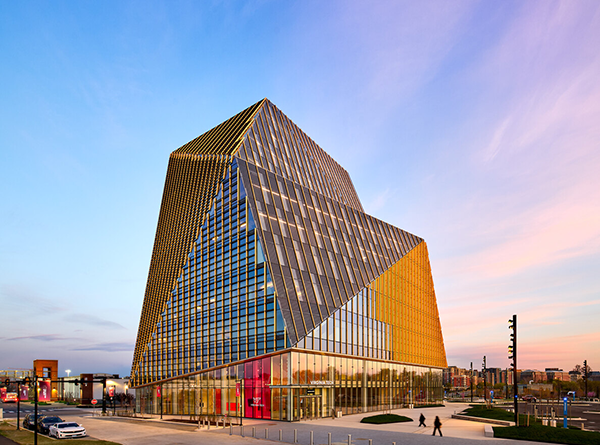 Virginia Tech's Academic Building One in Alexandria designed by Smith Group uses an advanced building-integrated photovoltaic (BIPV) glass facade to generate clean solar energy and shade the interior. 